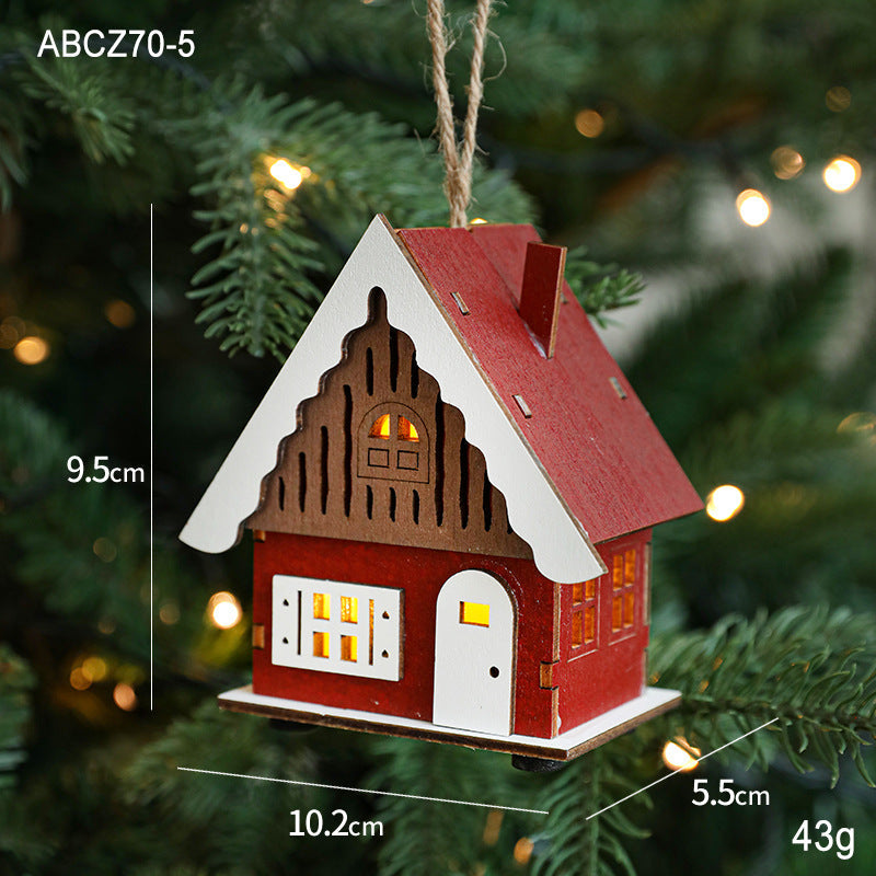 Illuminated wooden house for Christmas decoration