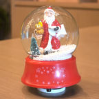 Christmas music box with snow globe effect