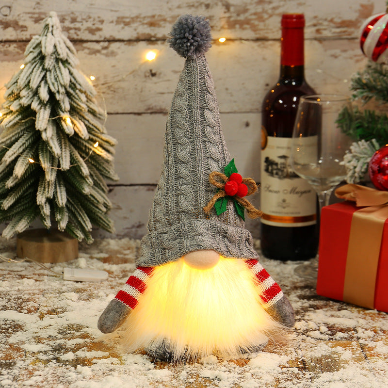 Glowing Christmas gnome with knitted hat