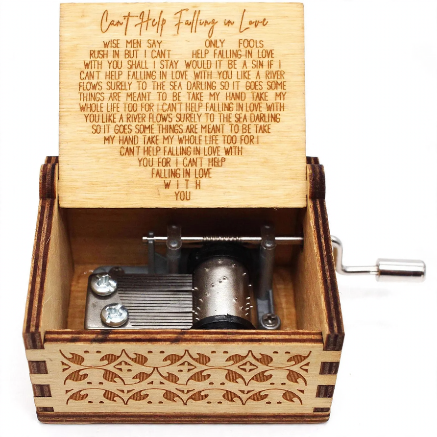 Hand-crank music box made of wood with laser engraving
