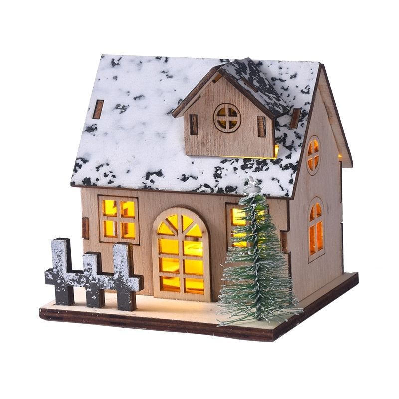 Illuminated wooden house for Christmas decoration