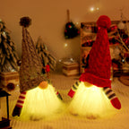 Glowing elf figure with knitted hat