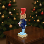 Decorative nutcracker figure with bear, synthetic resin