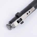 Close-up of the metal release mechanism and textured grip