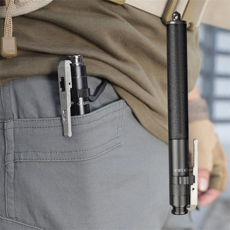 Compact telescoping stick clipped to a pants pocket