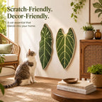 Botanical sisal cat scratcher mat in leaf shapes displayed as wall decor near a sitting cat.